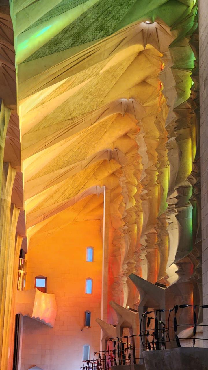 Light through the stained glass inside the Sagrada Familia basilica